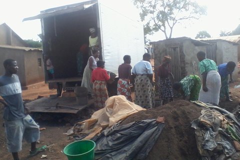 Mtandire Slum Settlement women entreprenuers loading their compost into a Four Seasons Nurseries Van. "Turning slum waste into wealth" - CCODE