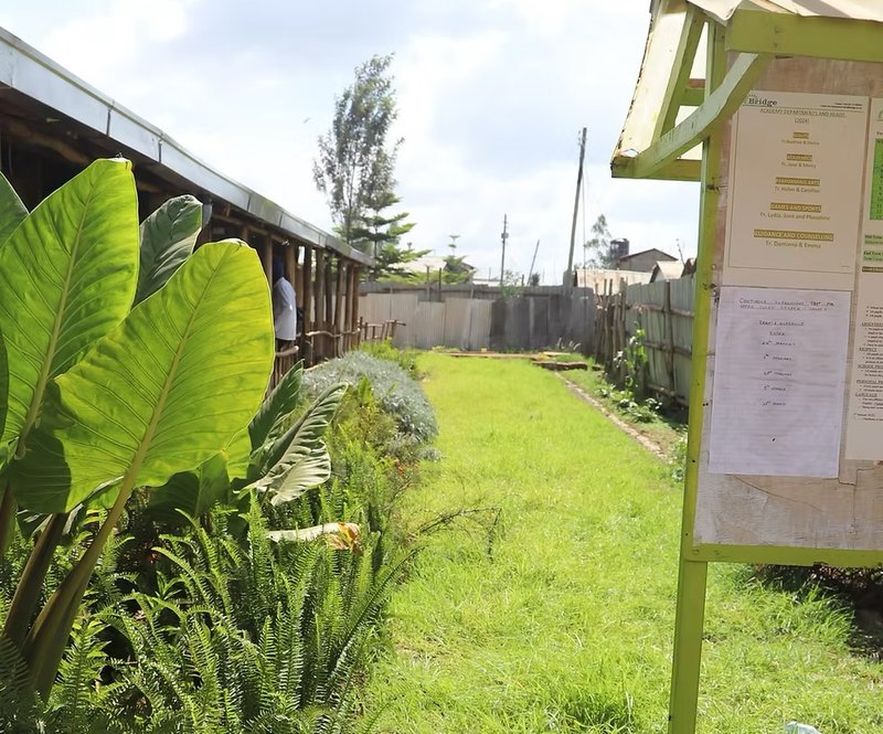 Planting at Bridge International Academy, Kibera, Nairobi. Photo credit: KDI.
